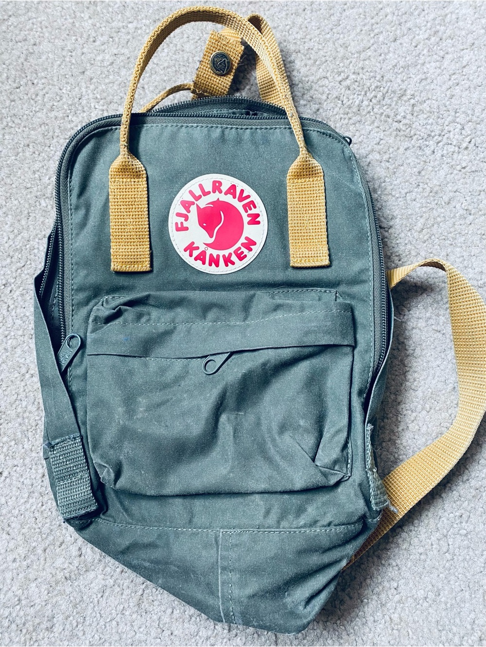 Fjallraven Kanken Travel Backpack in Forest Green with Mustard Handles